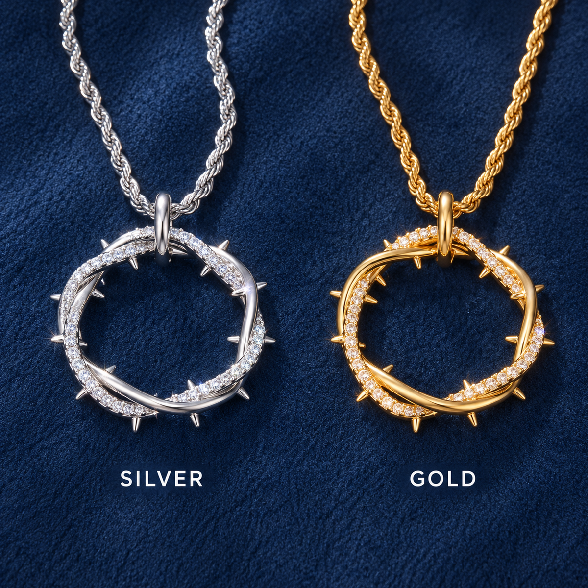 Silver and gold crown of thorns pendants side by side on dark navy fabric, labeled Silver and Gold.